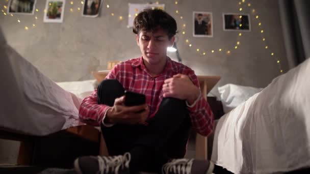 One Sad Teen Student Holding Mobile Phone While Depressed Sitting — Stockvideo