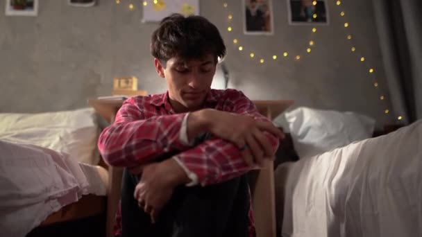 Young Arab Student Sits Floor Depression College Dormitory Hugging His — Vídeos de Stock