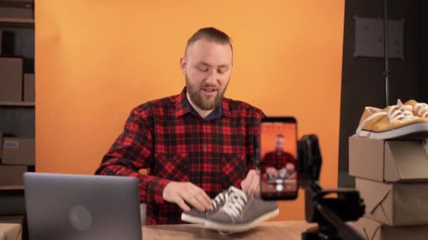 Influential Bearded Caucasian Man Live Streaming Clothing Review Home Studio — Vídeo de Stock