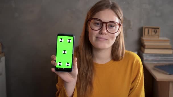 Happy Girl Sitting Holding Phone Chroma Key Camera Focus Cute — Stock videók