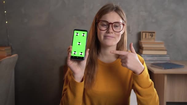 Happy Girl Sitting Holding Phone Chroma Key Camera Focus Cute — Stockvideo