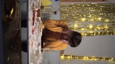 Tired drunk man with headache after party at home. Vertical video
