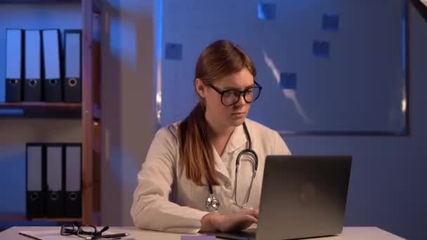 Female Doctor Checked Patients History Used Laptop Record Patient Information — Video Stock