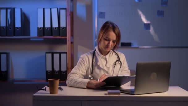 Doctor Stethoscope Clipboard Laptop Working Hospital Writing Prescription Healthcare Medical — Stock videók