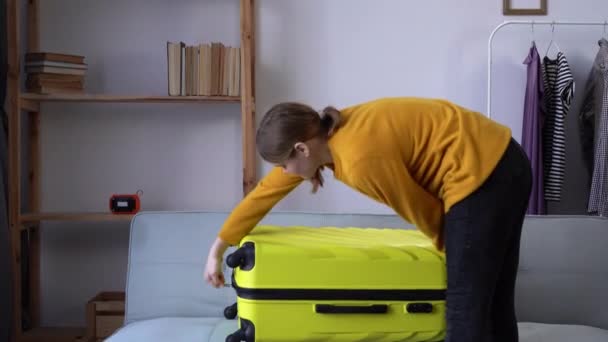 Happy Woman Preparing Packing Summer Clothes Yellow Suitcase New Journey — Vídeos de Stock