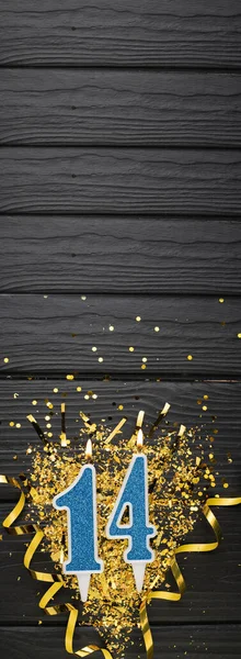 Number Blue Celebration Candle Gold Confetti Dark Wooden Background 14Th — стоковое фото