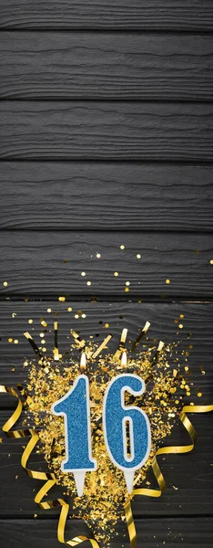 Number Blue Celebration Candle Gold Confetti Dark Wooden Background 16Th — Foto de Stock