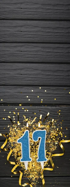 Number Blue Celebration Candle Gold Confetti Dark Wooden Background 17Th —  Fotos de Stock