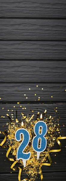 Number Blue Celebration Candle Gold Confetti Dark Wooden Background 28Th — Φωτογραφία Αρχείου
