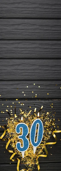 Number Blue Celebration Candle Gold Confetti Dark Wooden Background 30Th — Foto Stock