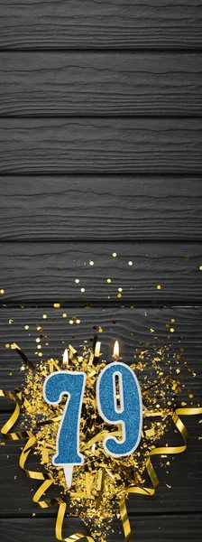 Number Blue Celebration Candle Gold Confetti Dark Wooden Background 79Th — Stock Photo, Image