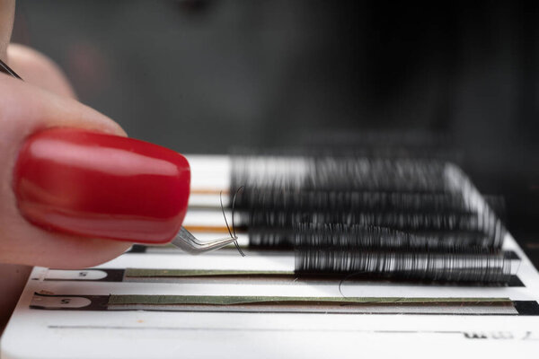 Eyelash extension tools. False eyelashes kit. Eyelash extension procedure concept. Close up