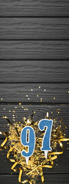 Number Blue Celebration Candle Gold Confetti Dark Wooden Background 97Th — Stock Photo, Image