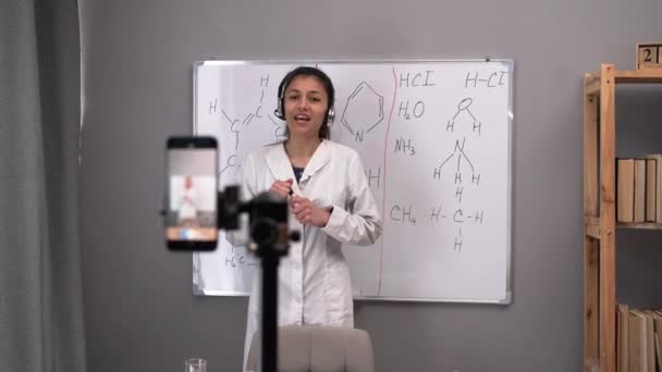 Female Teacher Blogger Standing Marker Board Recording Live Training Video — Stock Video