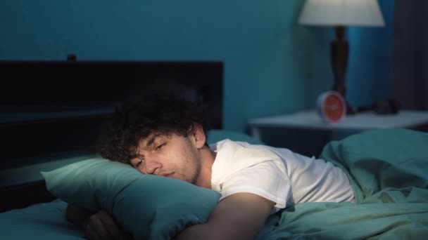 Young Man Lying Bed Late Night Trying Sleep Suffering Insomnia — Stock Video