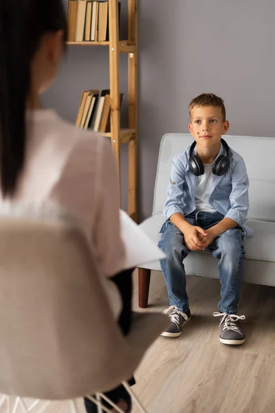 stock image Boy conversation with psychotherapist, therapist counsellor, visit to doctors office. Teen problems concept