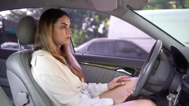 Young Caucasian Woman Sitting Car Seat Fastening Seat Belt Window — Stock Video