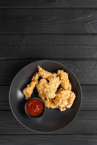 Chicken Breast Strips Tomatoes Ketchup Plate Black Background Top View — Stock Photo, Image