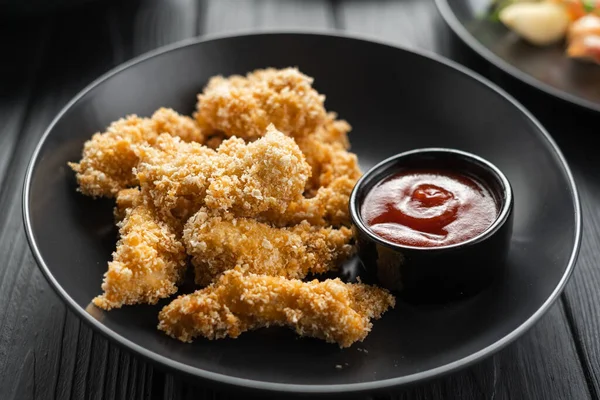 Delicious Crispy Fried Chicken Breast Strips Black Plate Close Nuggets — Stock Photo, Image