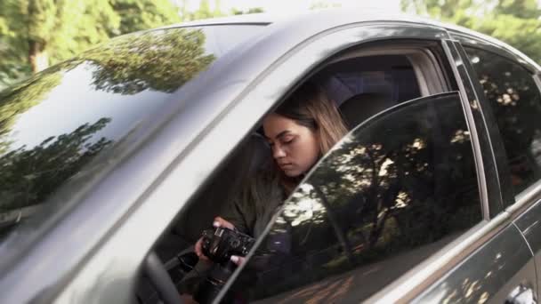 Woman Private Detective Paparazzi Camera Spying Car Close — стоковое видео