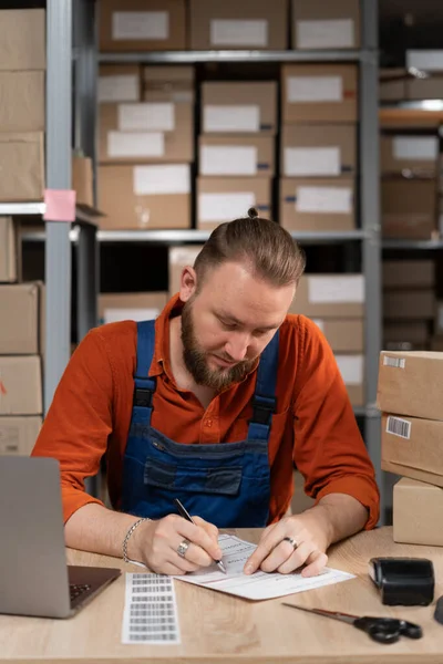 Male Employee Planning Products Distribution Warehouse Space Writing Address Sticker — Fotografia de Stock