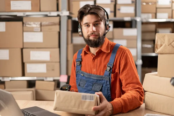 Delivery Service Man Talking Voice Picking Headset Holding Order Looking — Stock Photo, Image