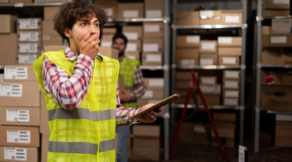 Shocked Arabic Warehouse Worker Tablet His Hands Problems Loading Copy — Stock Photo, Image