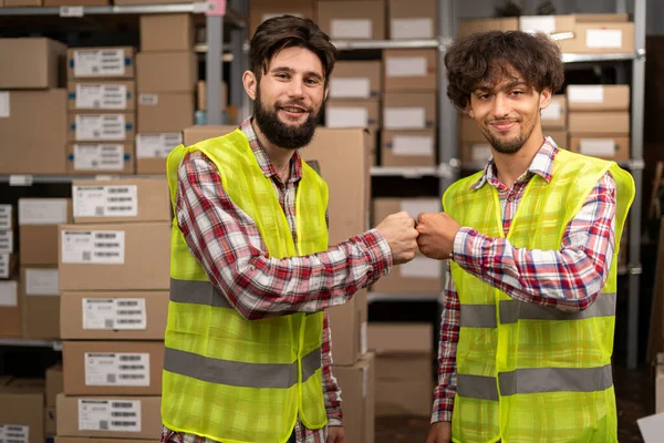 Warehouse Workers Giving Fists Each Other Industrial Workers Hands Touching — Stock Photo, Image