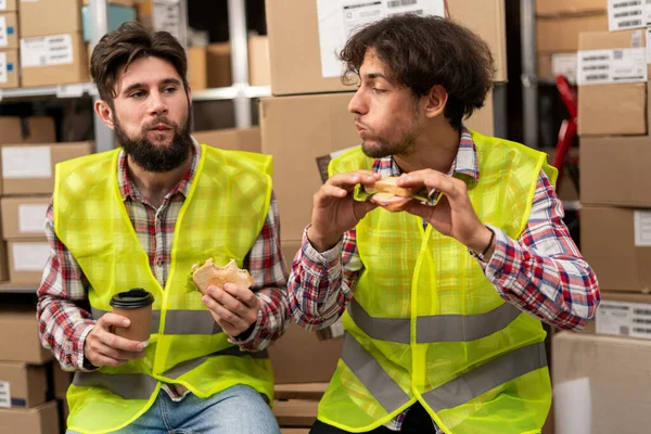 Time Break Two Workers Eating Sandwiches Drinking Coffee Talking While — Stock Photo, Image