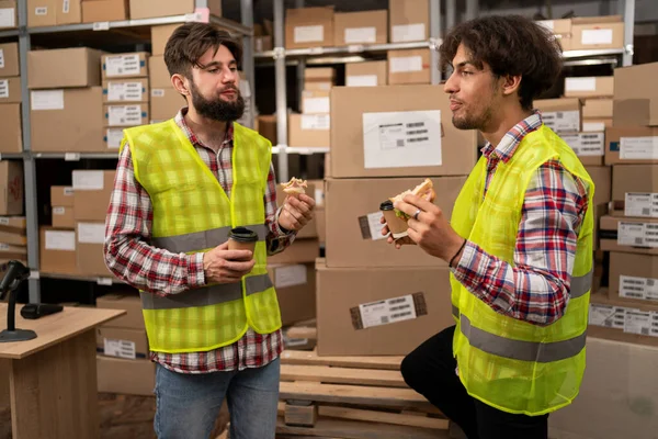 Warehouse Workers Having Lunch Break Resting Eat Talk Copy Space — Stock Photo, Image