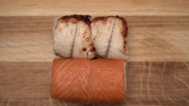 Close View Process Preparing Rolling Sushi Salmon Eel Making Sushi — Stock Video