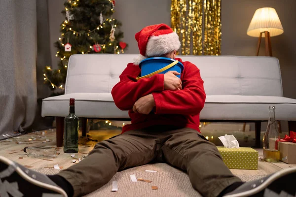 Bearded Man Has Severe Stomach Ache Sits Couch Bucket Christmas — Stock Photo, Image