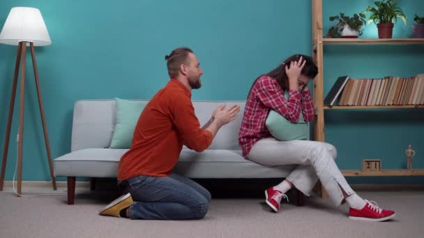 Married Couple Quarrel Sofa Husband Asks His Wife Forgiveness His — Stock Video