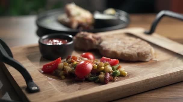 Close Womans Hands Eating Vegetables Pork Steak While Sitting Restaurant — Stock Video