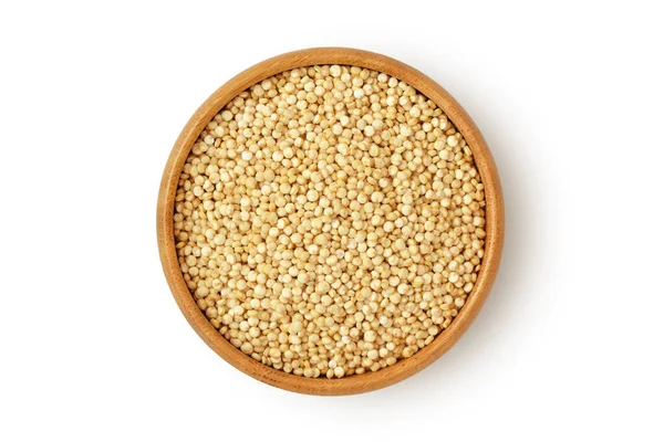 Quinoa in wooden bowl on white background