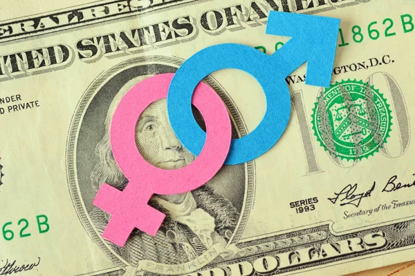 按美元钞票捆绑在一起的男女性别符号 性别关系概念 — 图库照片