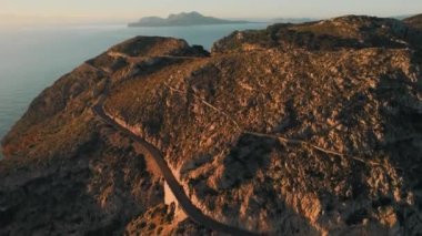 Curved mountain road leads across mountain road, view from above Majorca Island, Balearic Islands. Spain