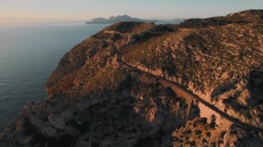 Curved mountain road leads across mountain road, view from above Majorca Island, Balearic Islands. Spain