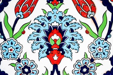 Çiçek motifleri, dokusu ve arkaplanı olan renkli geleneksel Türk seramik deseni.