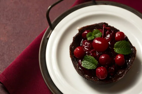 Chocolate Dessert Cherries Mint Plate Burgundy Background — Stock Photo, Image