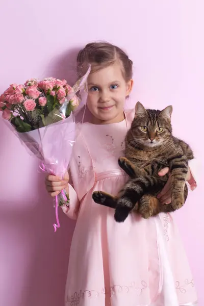 Cute Little Girl Cat Pink Dress Holds Bouquet Pink Roses Stock Image