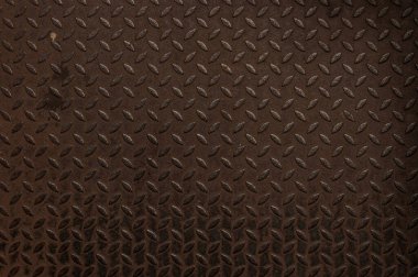 Arka planda eski elmas çelik plaka dokusu. Eski paslı arkaplan