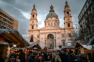 Budapest, Hungary - December 27, 2018: Christmas market fair in front of St. Stephen's Basilica in Budapest, Hungary, Europe clipart