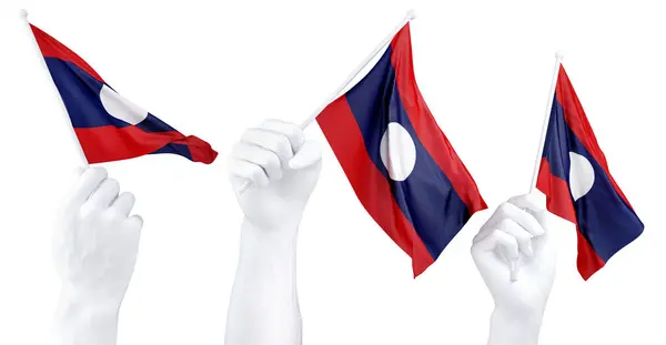 三只孤零零的手挥动着老挝国旗 象征着国家的骄傲和统一 图库图片