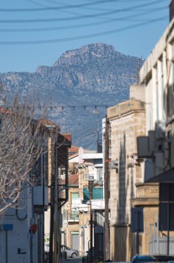Nicosia city street leading to the Pentadaktylos mountain in Cyprus clipart