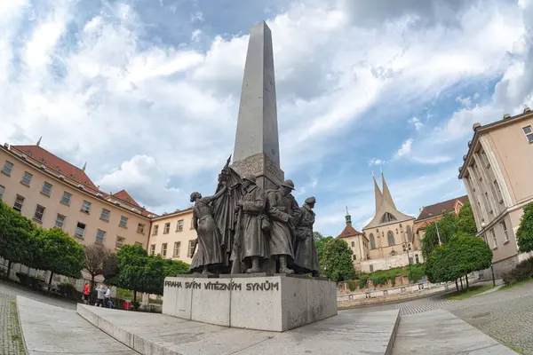 stock image Prague, Czech Republic - May 23, 2019: Palacky Square, Czechoslovak Legion monument and Emmaus monastery on the background