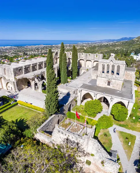 stock image Bellapais Abbey ruins overlooking Kyrenia city and Mediterranean sea. Kyrenia District, Cyprus