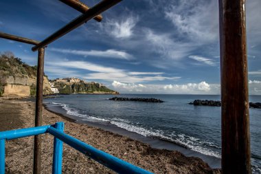 Colorful wooden hut on Chiaiai beach, Procida Island, Italy.