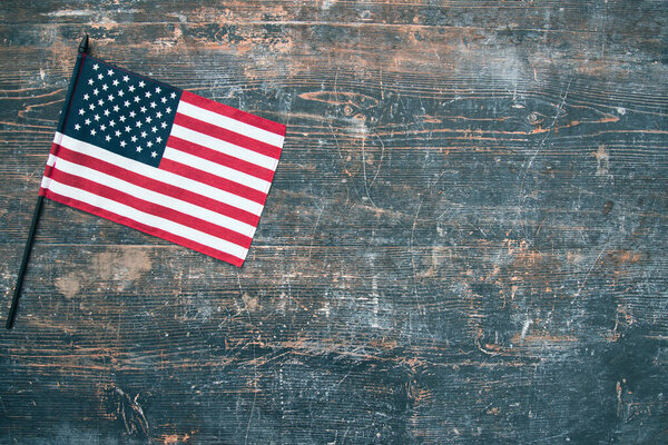 Celebrating Independence Day. United States of America USA flag on wooden background, for 4th of July