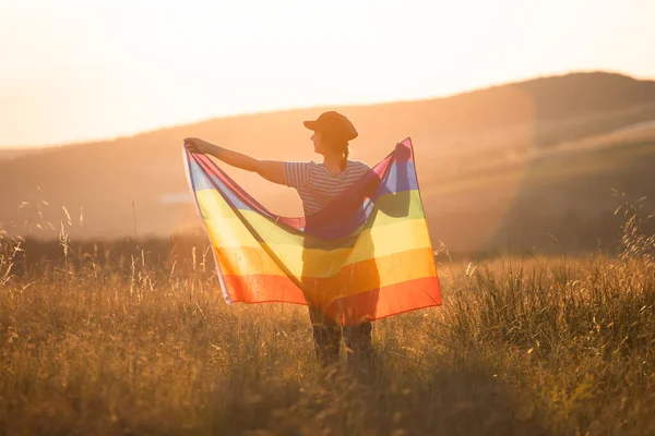 Woman Holding Gay Rainbow Flag Magic Sunset Happiness Freedom Love — Stockfoto